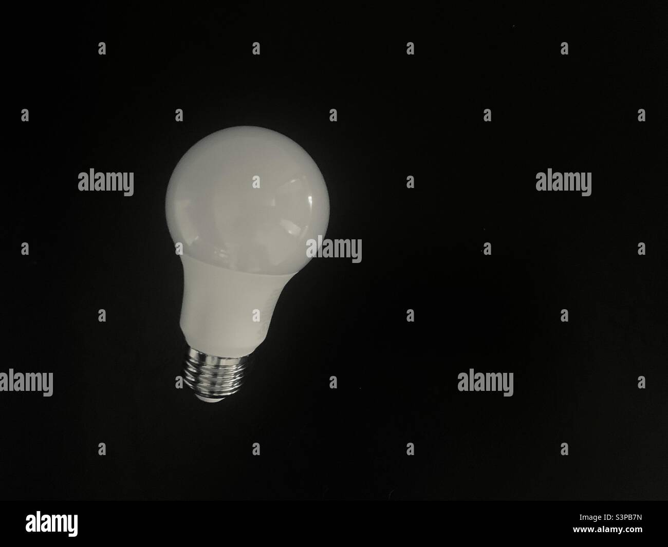 Lightbulb on a black background- light bulb Stock Photo