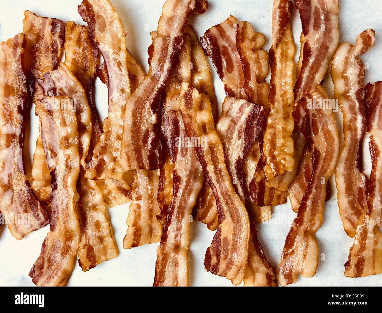 Cooked bacon strips, top view Stock Photo
