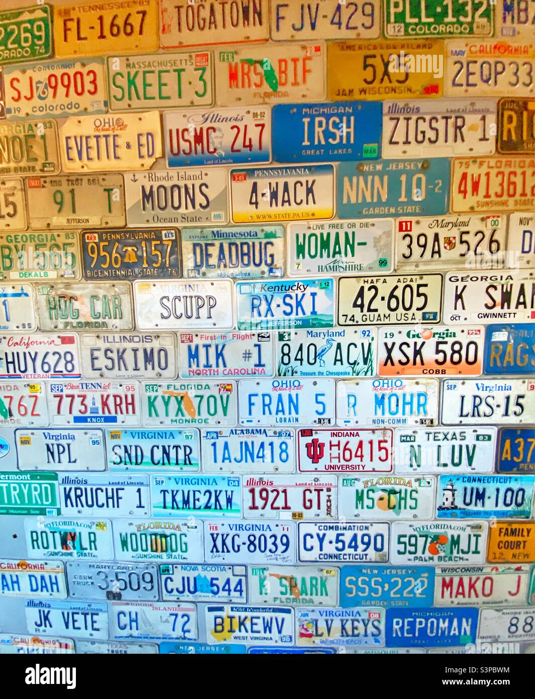 License plates on a wall Stock Photo