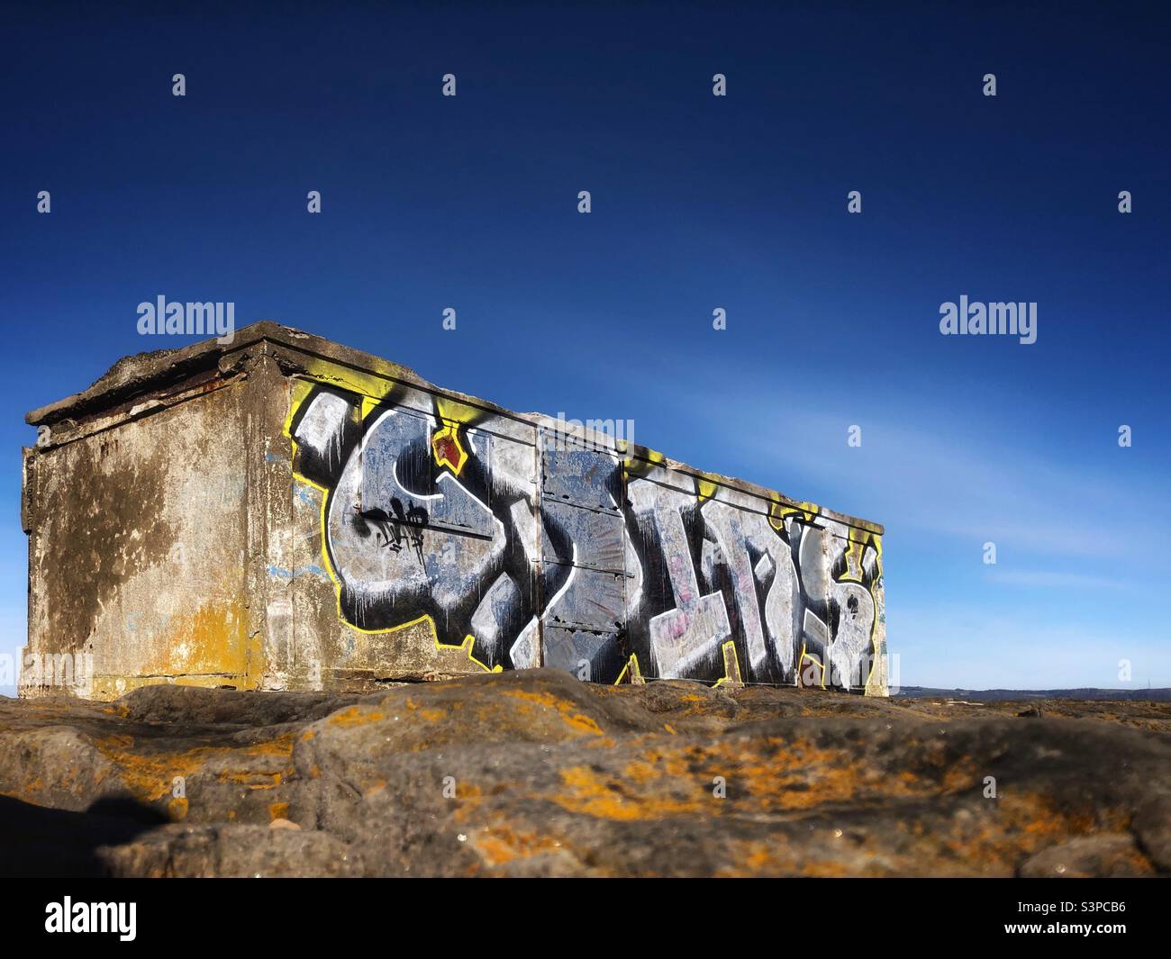 Abandoned and graffitied building on Granton breakwater, Edinburgh Scotland Stock Photo