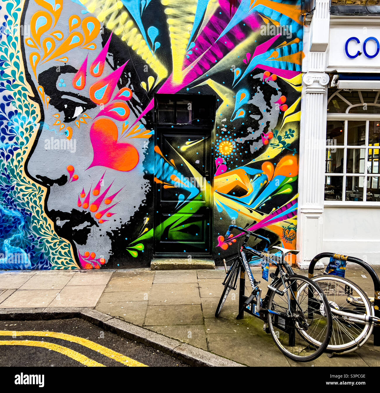 Graffiti street art in the Shoreditch area of London, UK - January 2022 - Smartphone Captured Stock Image