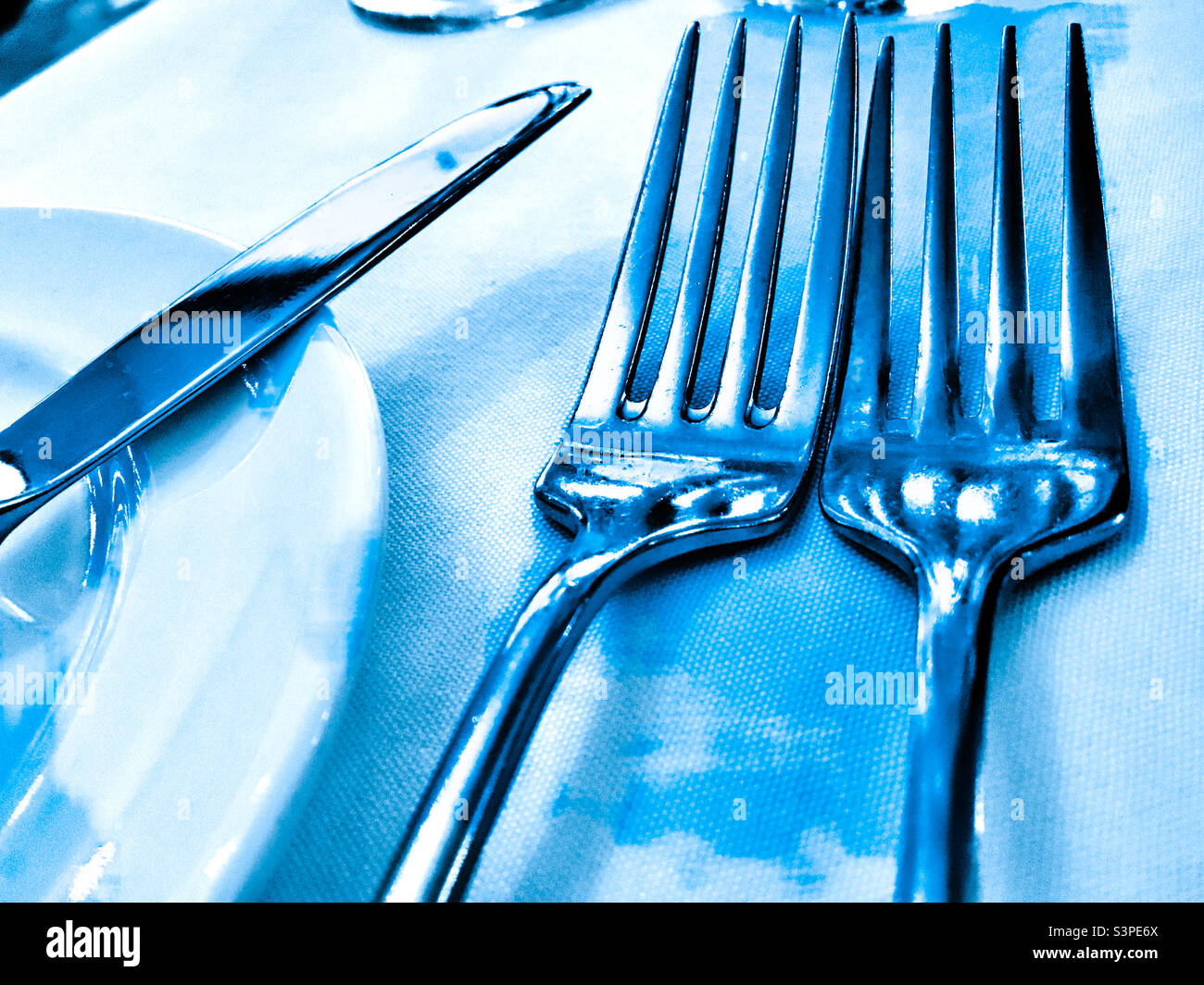 Table setting forks and knife Stock Photo Alamy