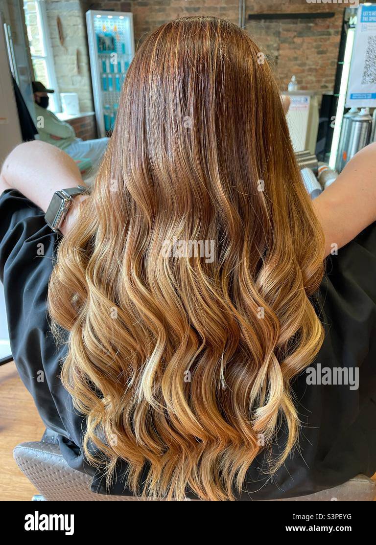 Beautiful red blonde balayage Stock Photo - Alamy