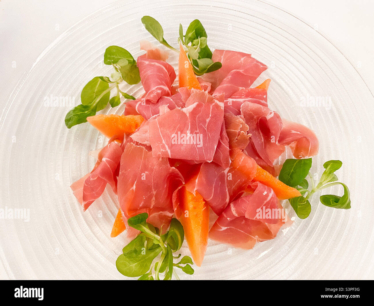 Plate of fresh ham and melons - Smartphone Captured Stock Image