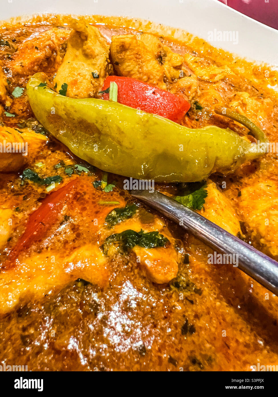 Chicken and chilli Balti curry Stock Photo