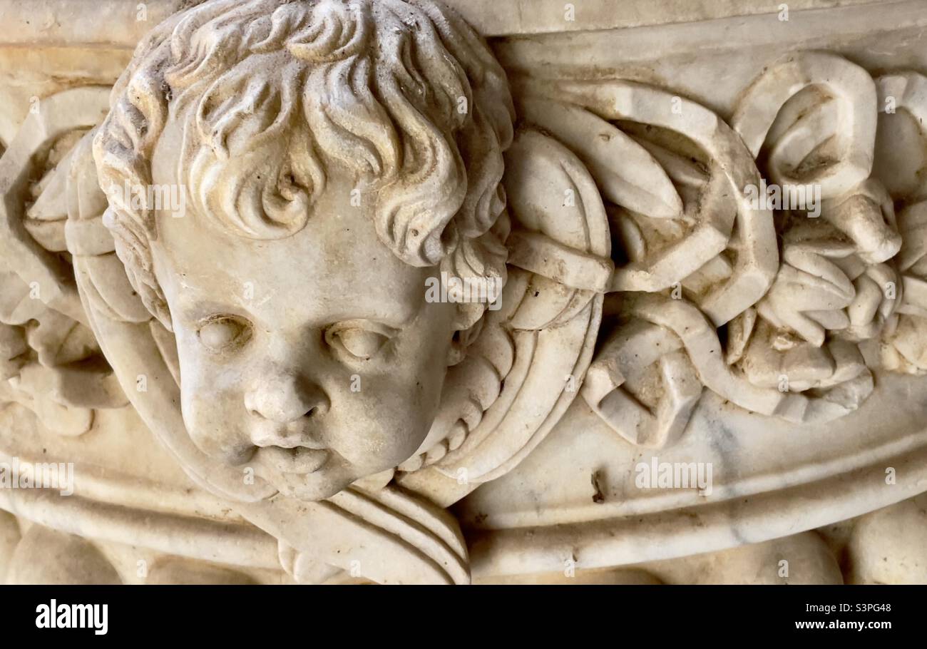 A detail of a neoclassical font in the porch of the parish church of Cotheridge, Worcestershire UK - Smartphone Captured Stock Image