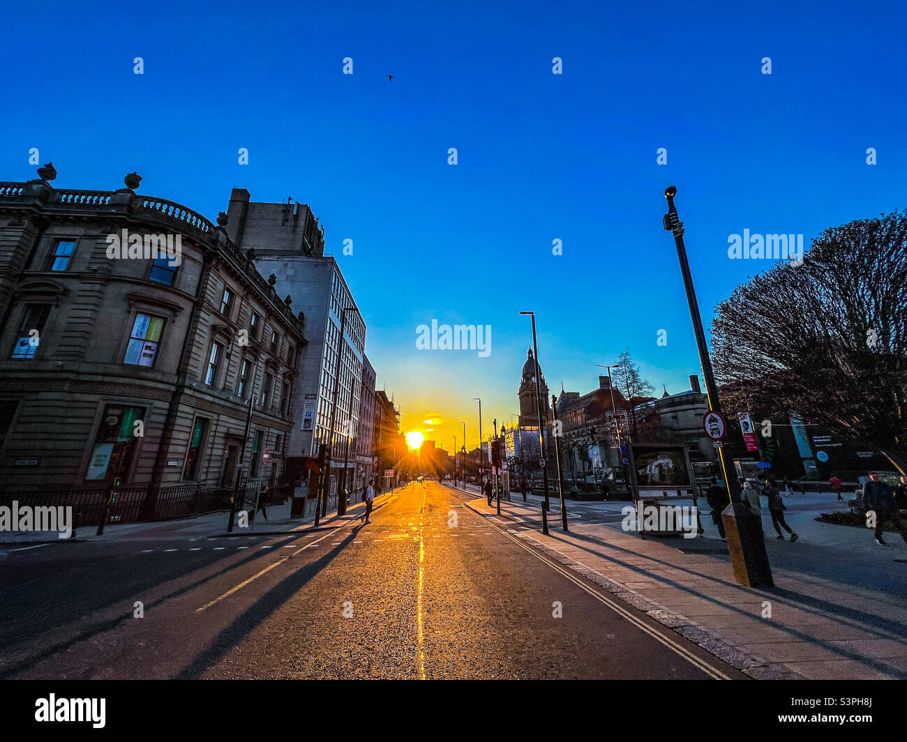 View of Leeds Headrow during sunset Stock Photo