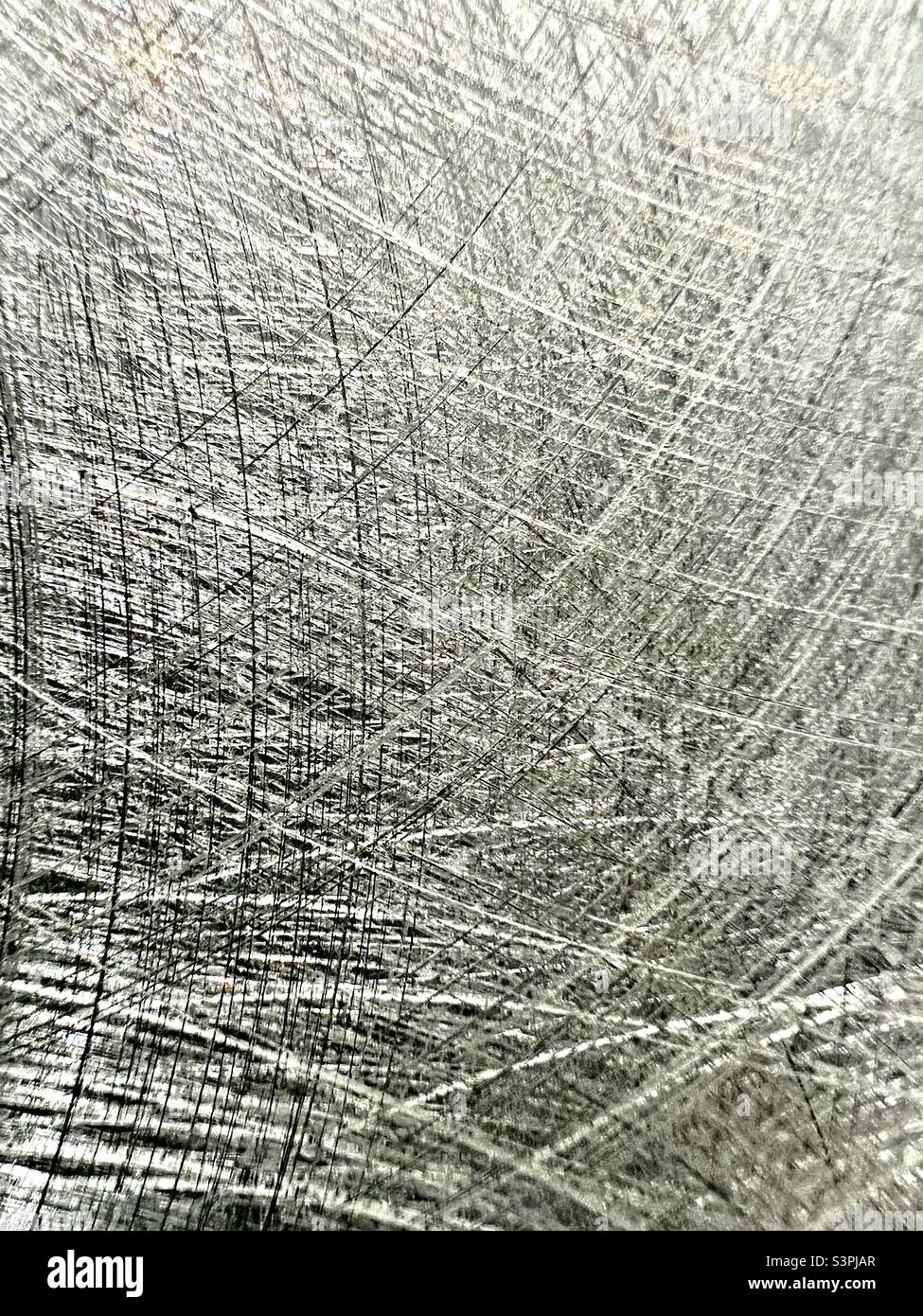 Scratches in bright metal Stock Photo