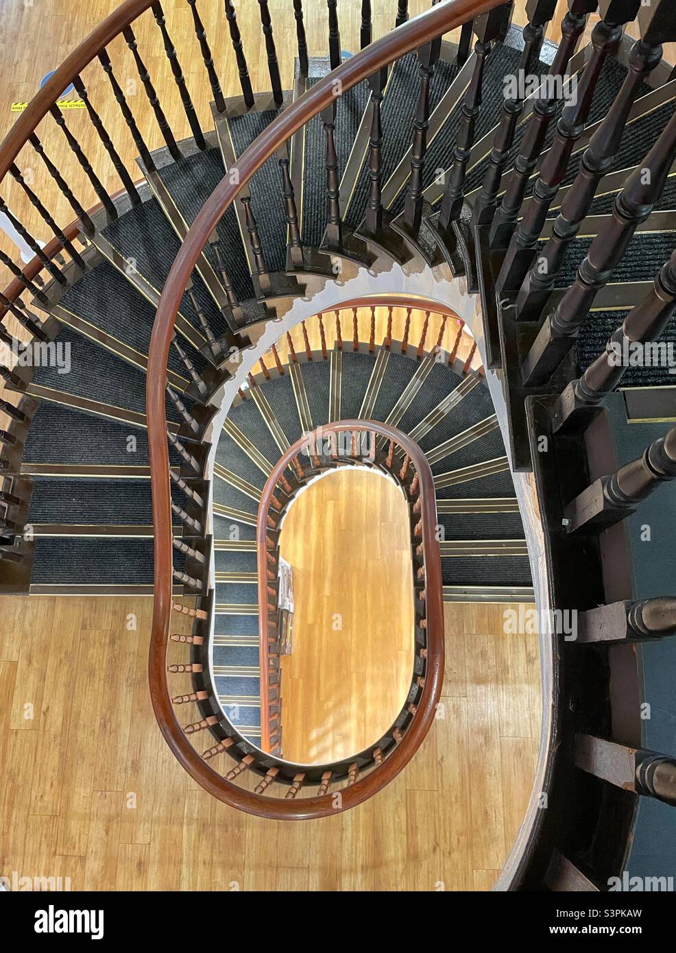 Spiral staircase in the Portmeirion shop, Porthmadog, Snowdonia, North Wales. - Smartphone Captured Stock Image