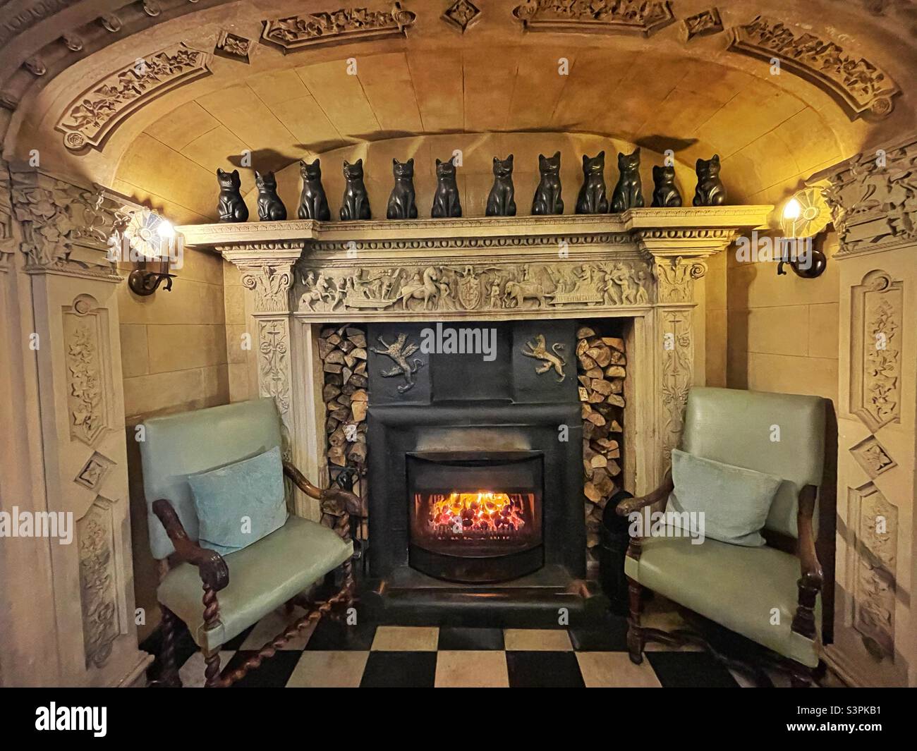 Fireplace in the Portmeirion Hotel, North Wales. Stock Photo