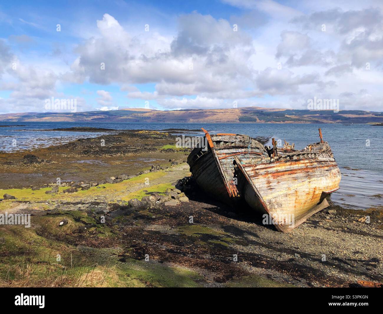 Wrecked wooden boats at Salen, Isle of Mull, Scotland Stock Photo