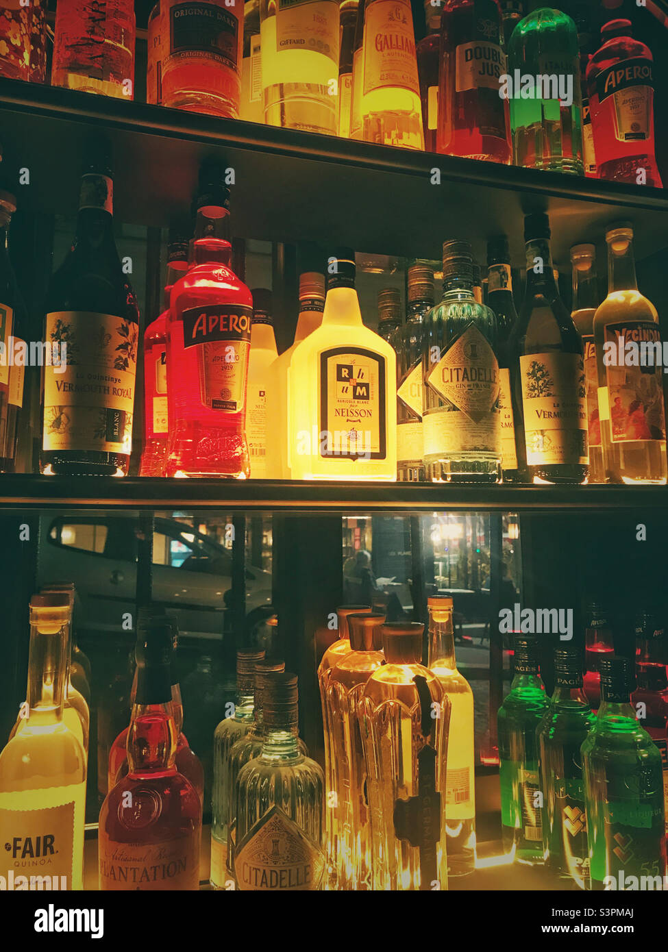 A selection of alcoholic drinks on a bar in Paris - Smartphone Captured Stock Image