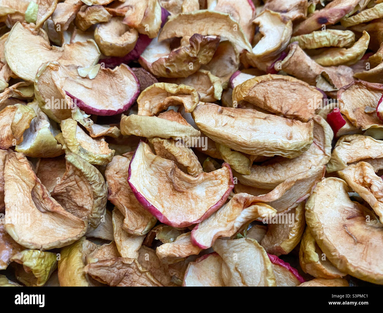 Background of dried apples in closeup. Texture of dried apples Stock Photo Alamy