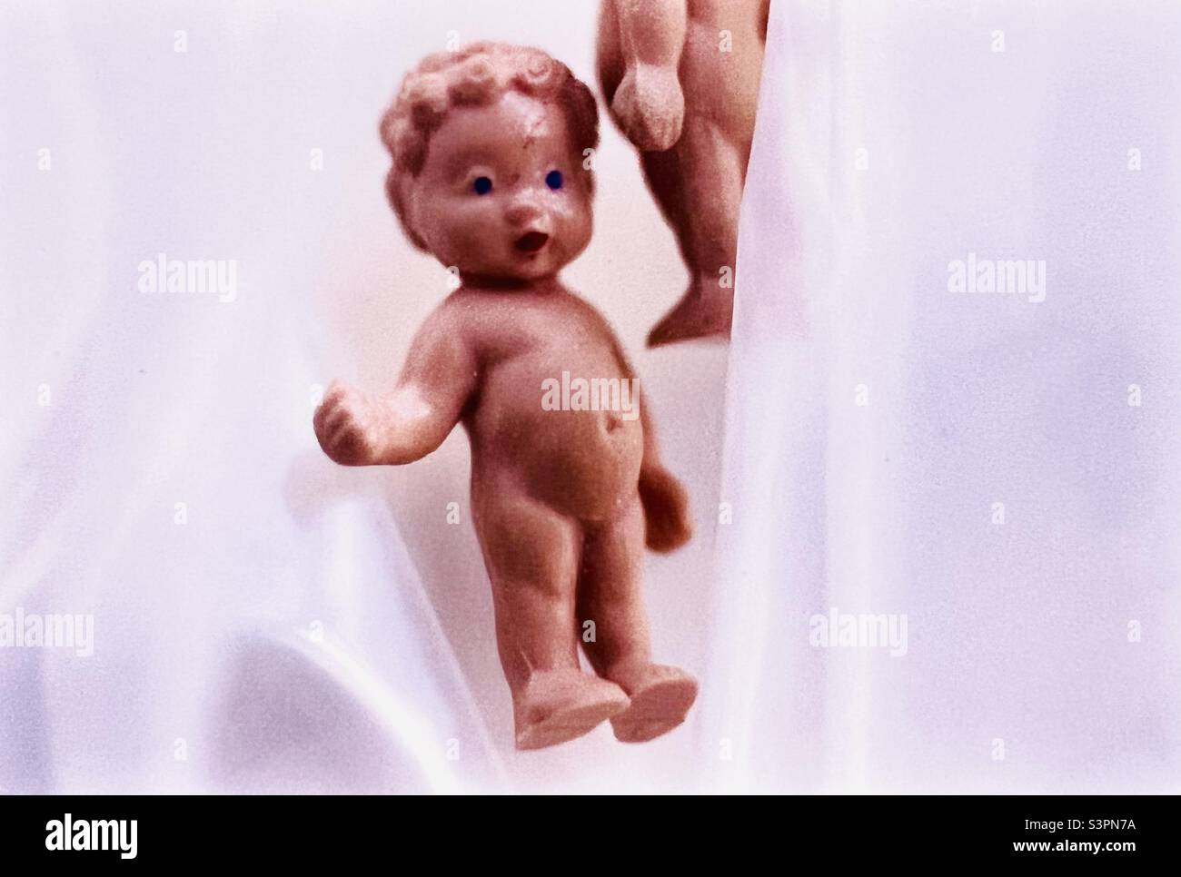 Tiny Vintage baby dolls Stock Photo