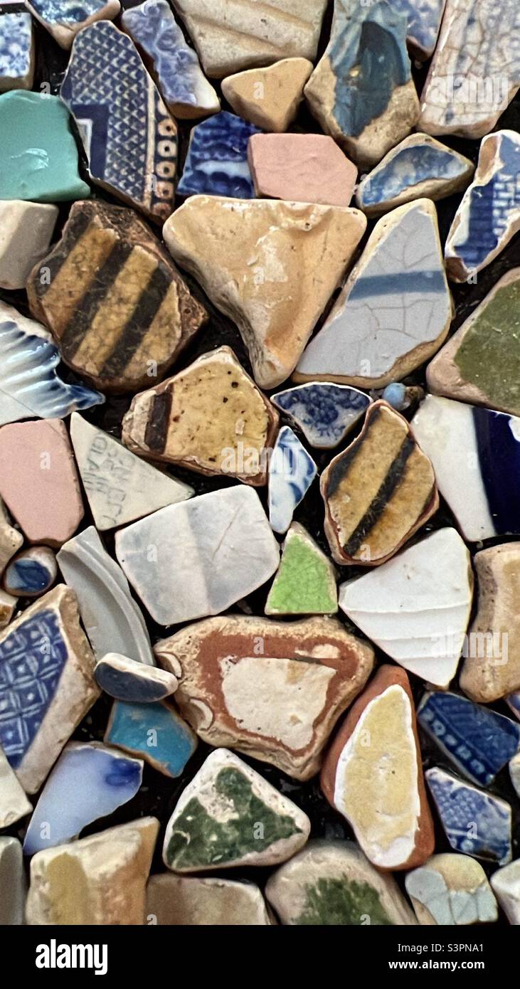 Pottery sherds from 17th 18th 19th centuries found in River Thames by licensed Mudlark on canvas for display Stock Photo