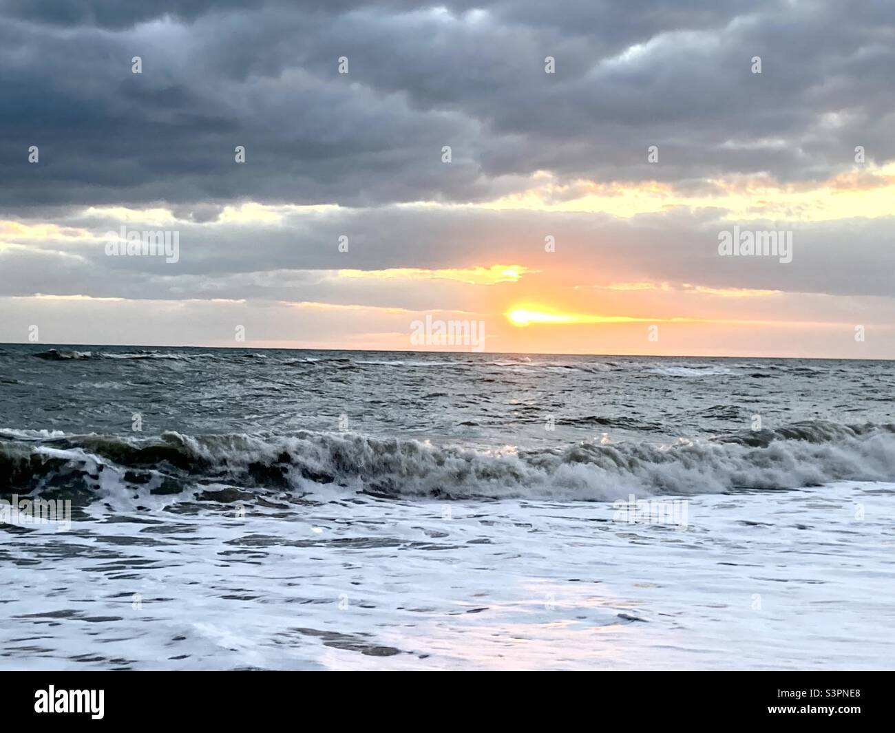 Sunrise on a cloudy morning over Atlantic Ocean in Florida - Smartphone Captured Stock Image
