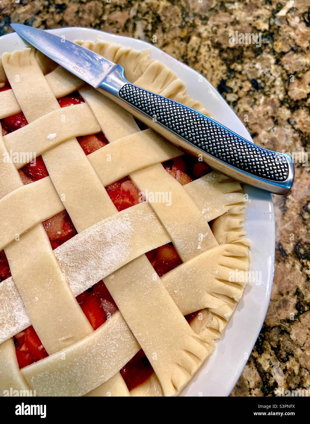 Strawberry Rhubarb pie before baking Stock Photo