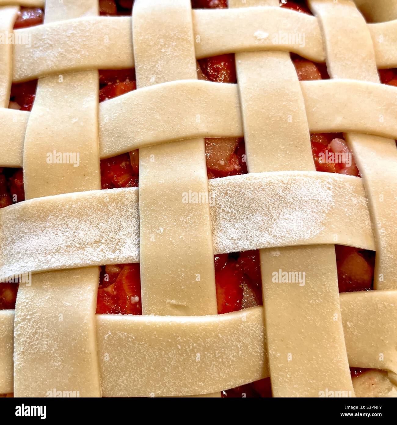 Strawberry Rhubarb lattice pie before baking Stock Photo
