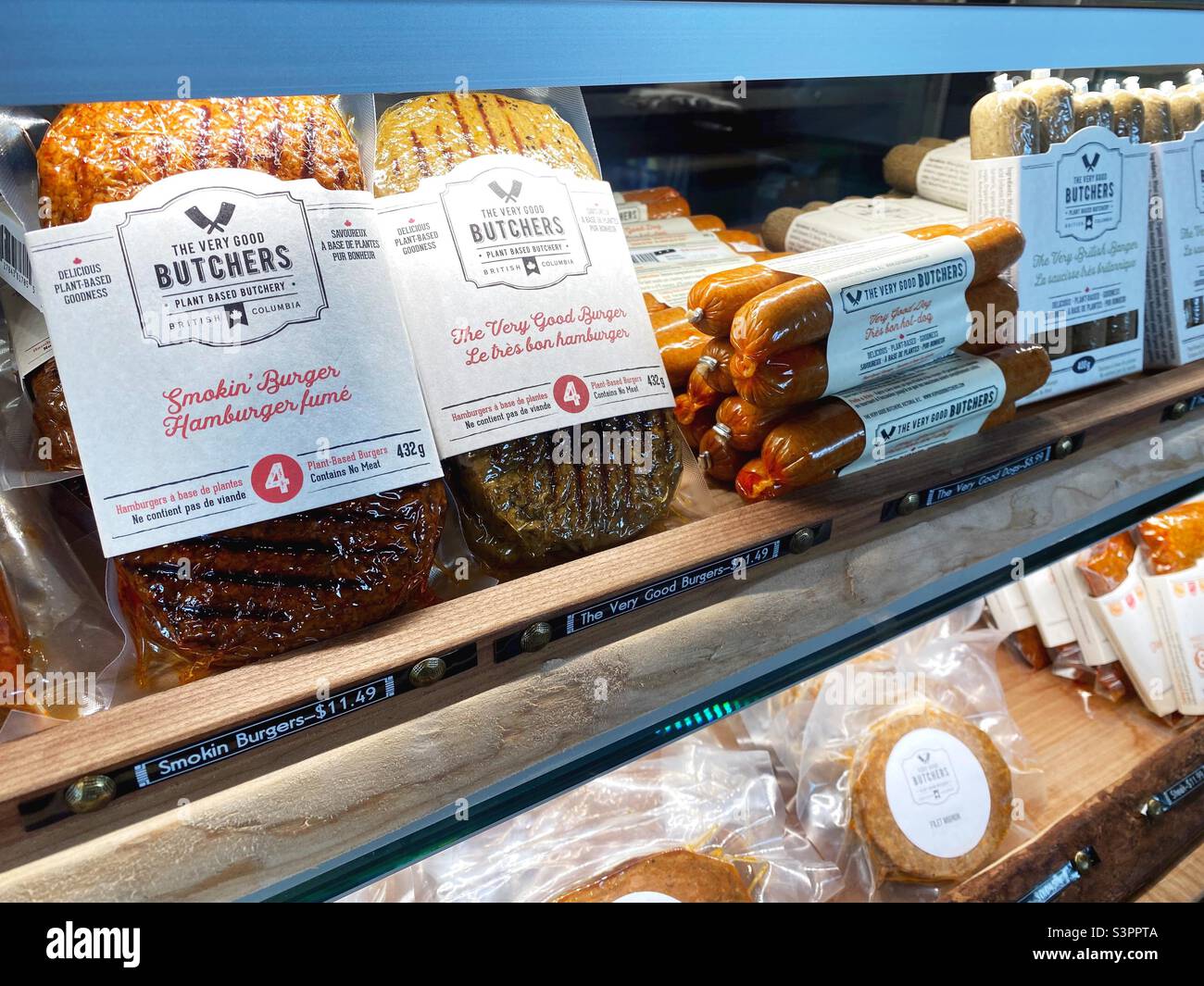 A display case with vegan meats at the Very Good Butchers in Victoria, British Columbia, Canada. Stock Photo