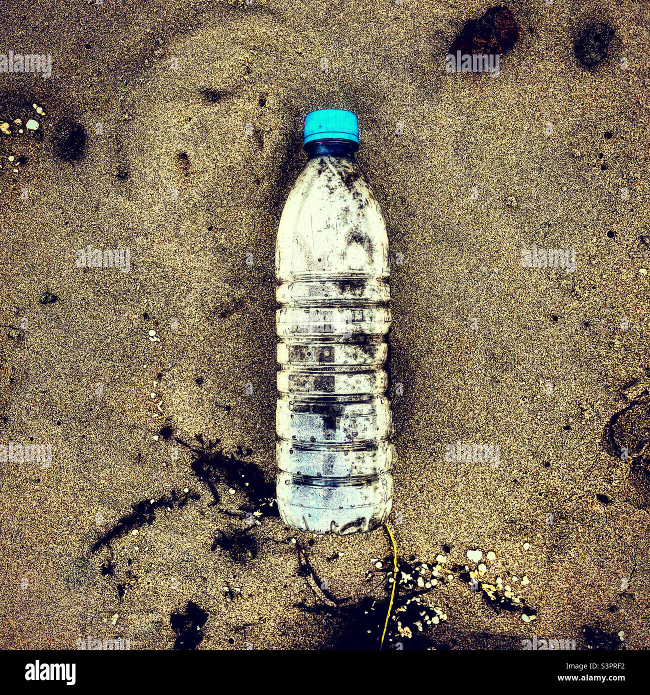 plastic bottle polution on the beach Stock Photo
