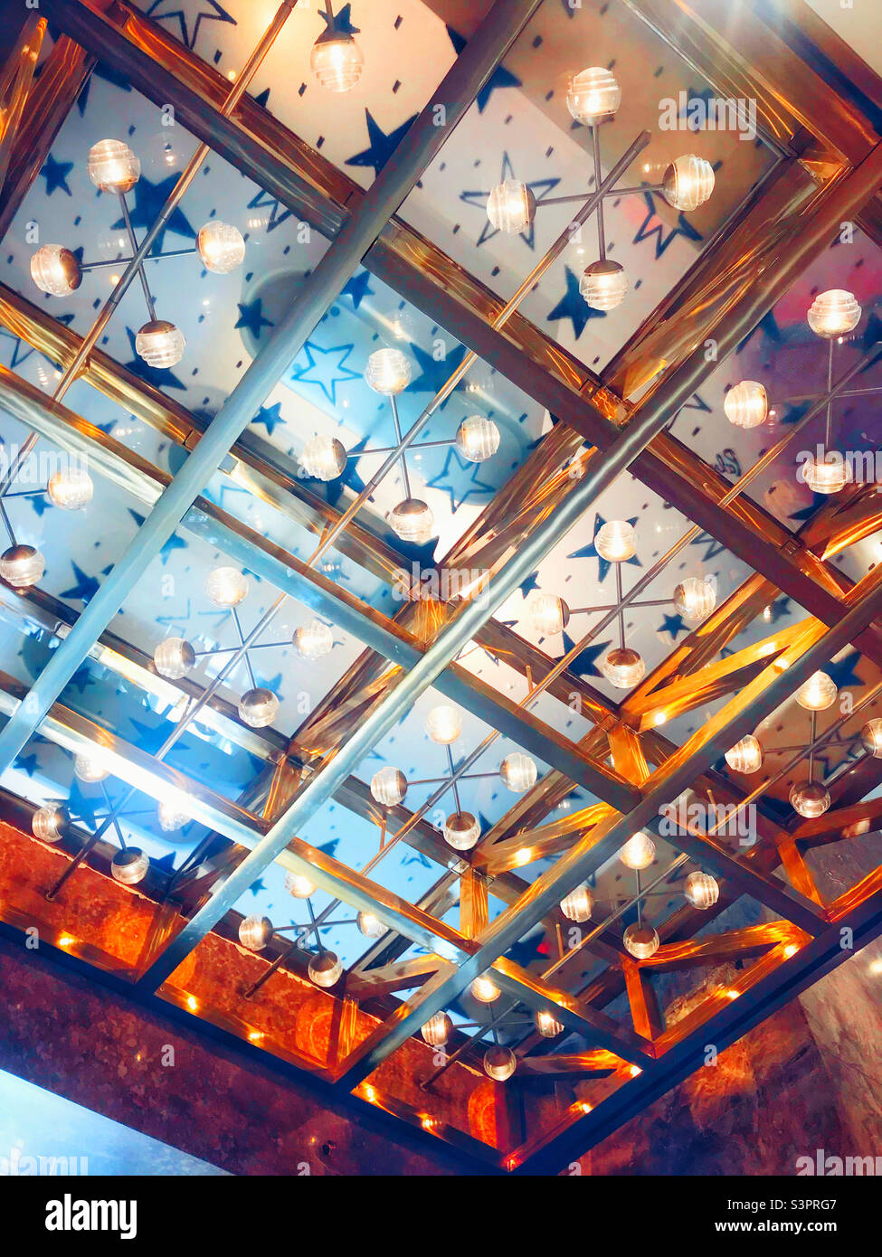 Beautiful ceiling lighting in the Galeries Lafayette, Champs-Élysées, Paris - Smartphone Captured Stock Image