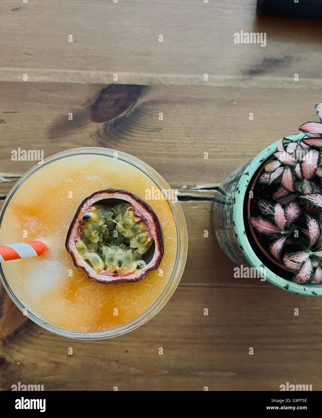 Frozen passion fruit margarita Stock Photo Alamy