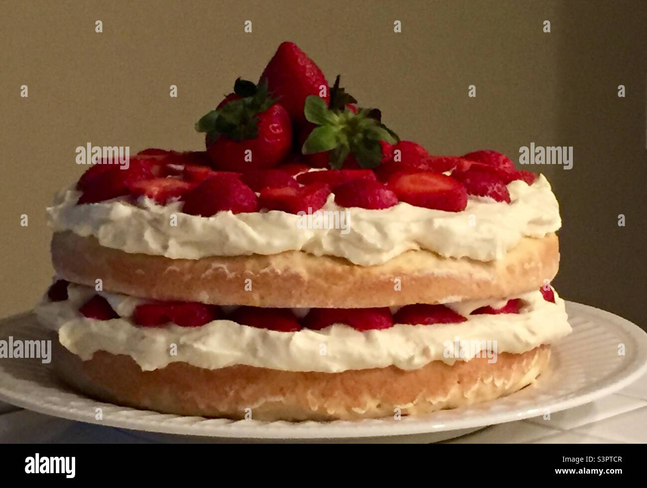 Strawberry Shortcake Cake with whipped cream Stock Photo