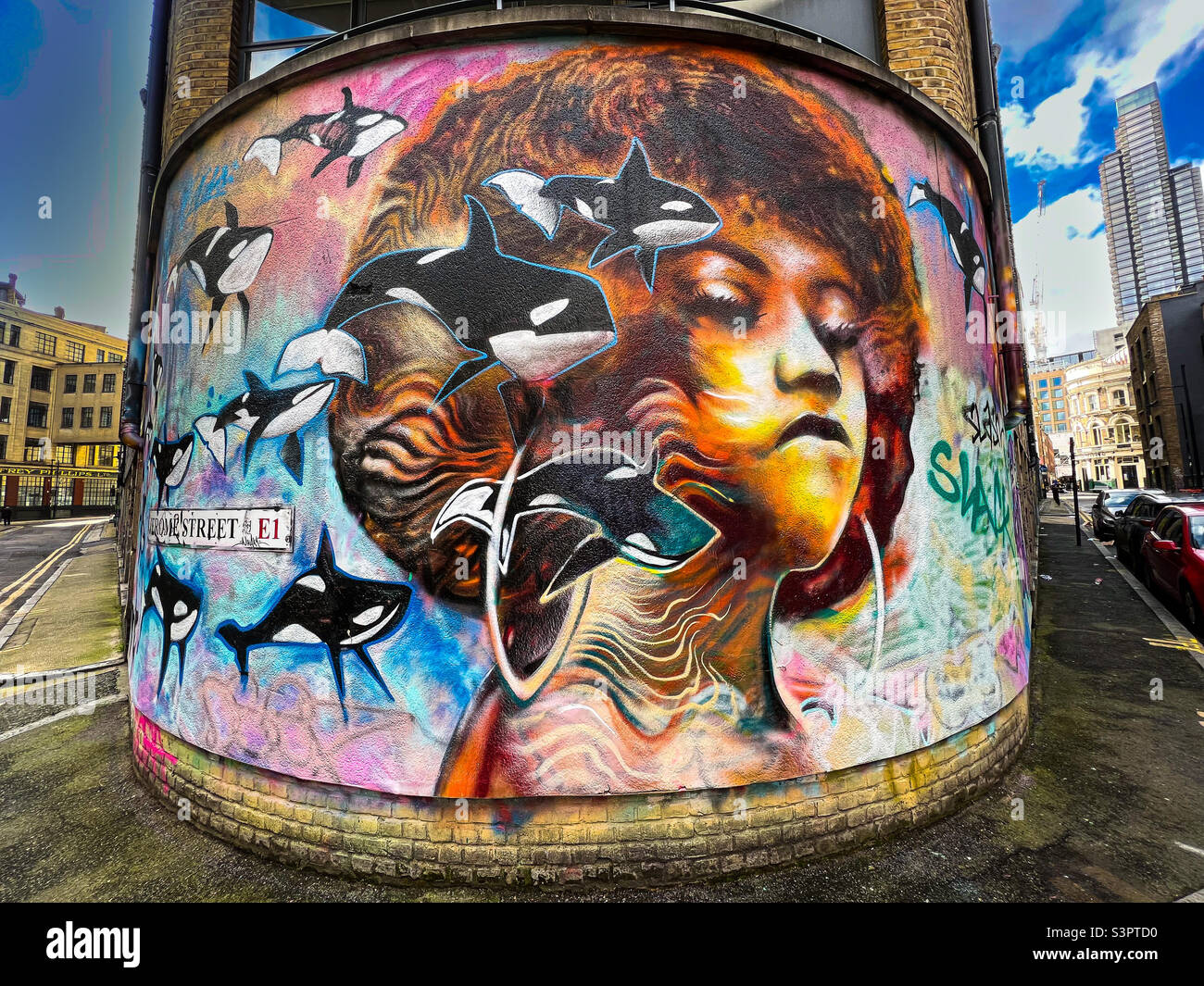 Graffiti street art on curved wall at Jerome Street, Shoreditch, London - January 2022 Stock Photo