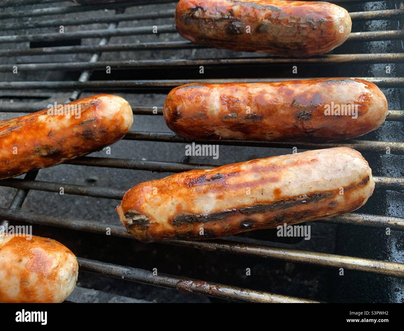 Sausages on a barbecue Stock Photo