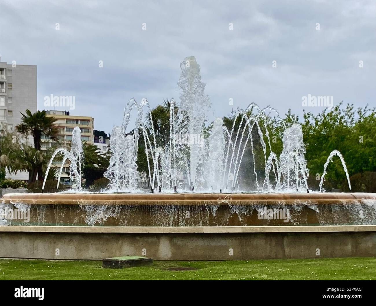 Fountain in the middle of a roundabout Stock Photo Alamy