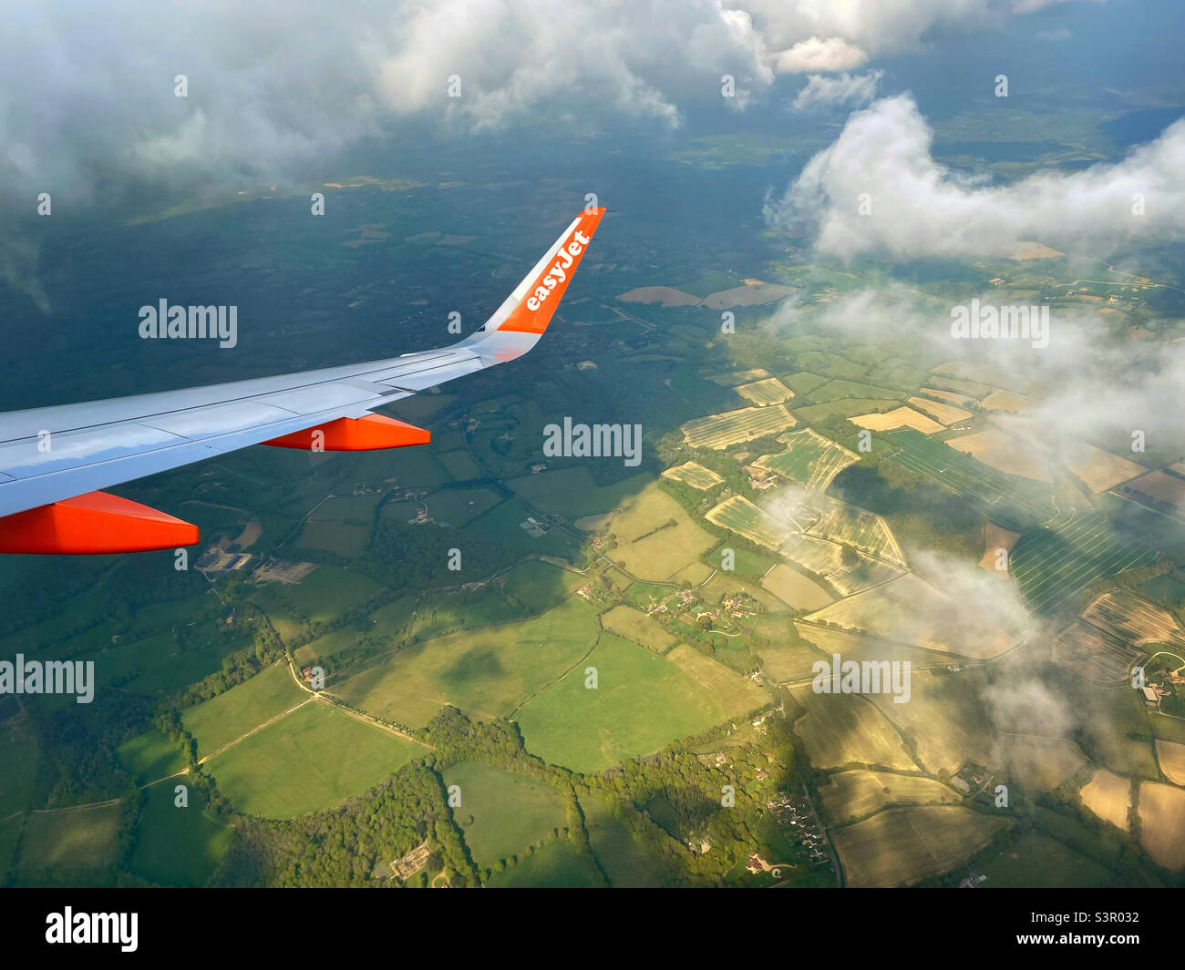 easyJet A320 Airbus aircraft coming in to land at London Gatwick Airport (LGW). The view from seat 23F. Photo ©️ COLIN HOSKINS. - Smartphone Captured Stock Image
