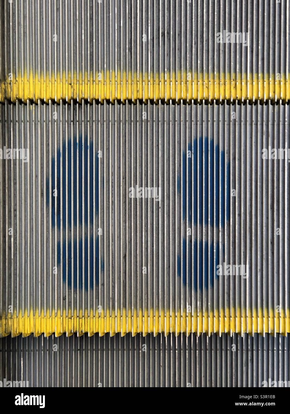 Footprints on the escalator - Smartphone Captured Stock Image