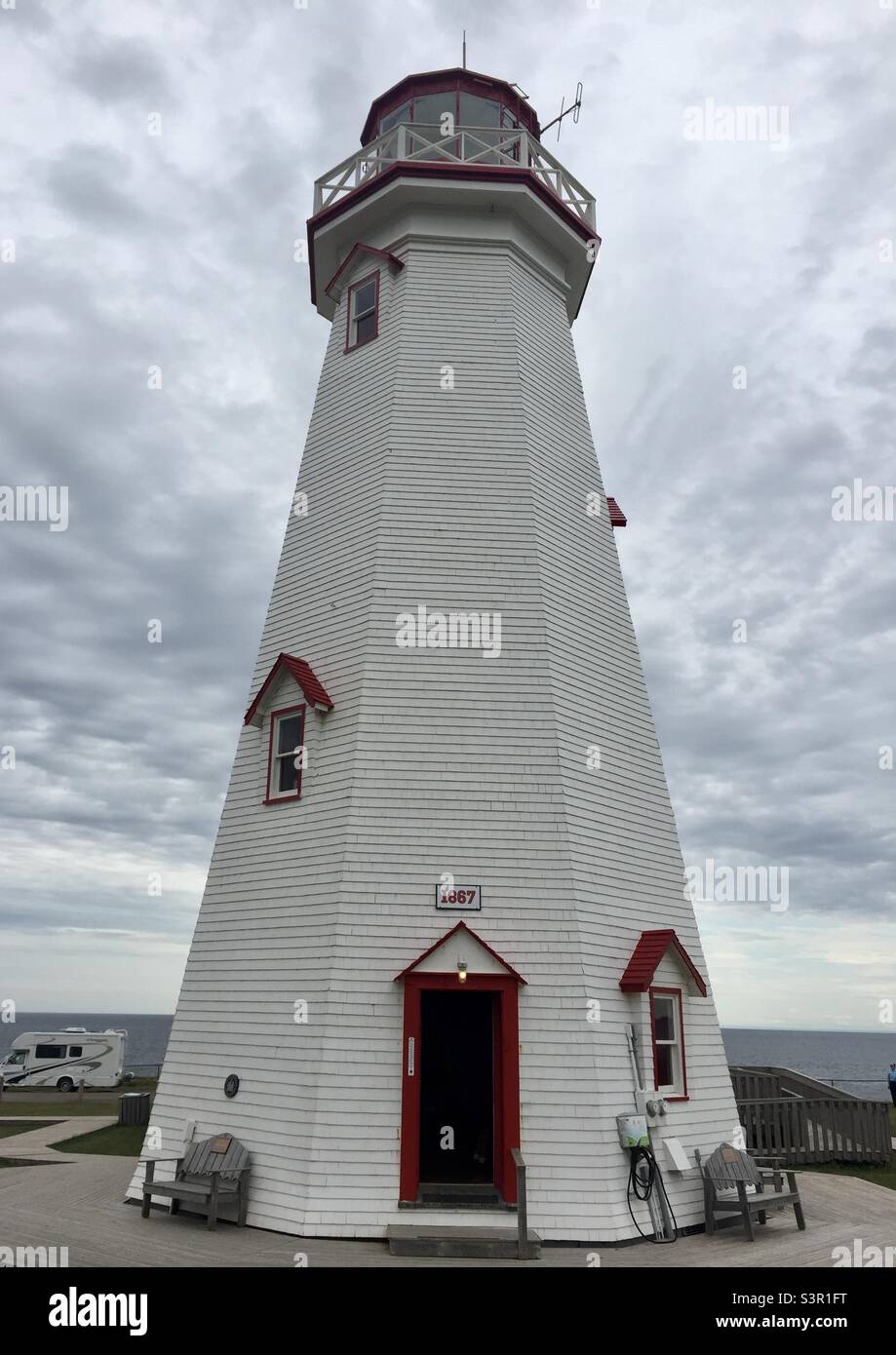The East Point Lighthouse in PEI, on a cloudy day. - Smartphone Captured Stock Image