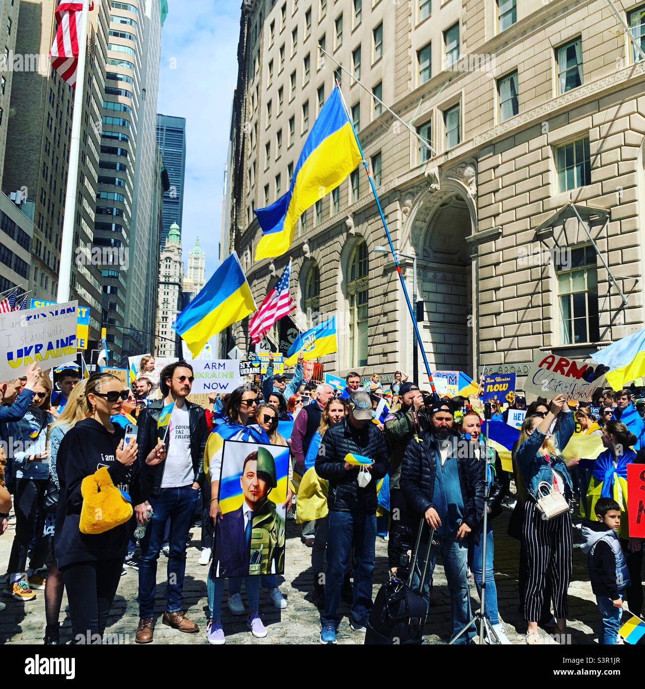 23 April, 2021, people urge the US and other powerful countries to help Ukraine defend itself at the Arm Ukraine Now rally, Bowling Green, Lower Manhattan, New York, New York, United States - Smartphone Captured Stock Image