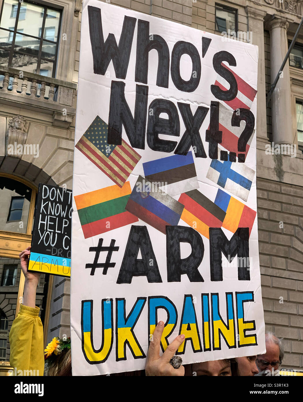 23 April, 2021, a sign at the Arm Ukraine Now rally asks “Who’s Next?” suggesting that Russian President Vladimir Putin will invade other countries if Ukraine is not successfully defended - Smartphone Captured Stock Image
