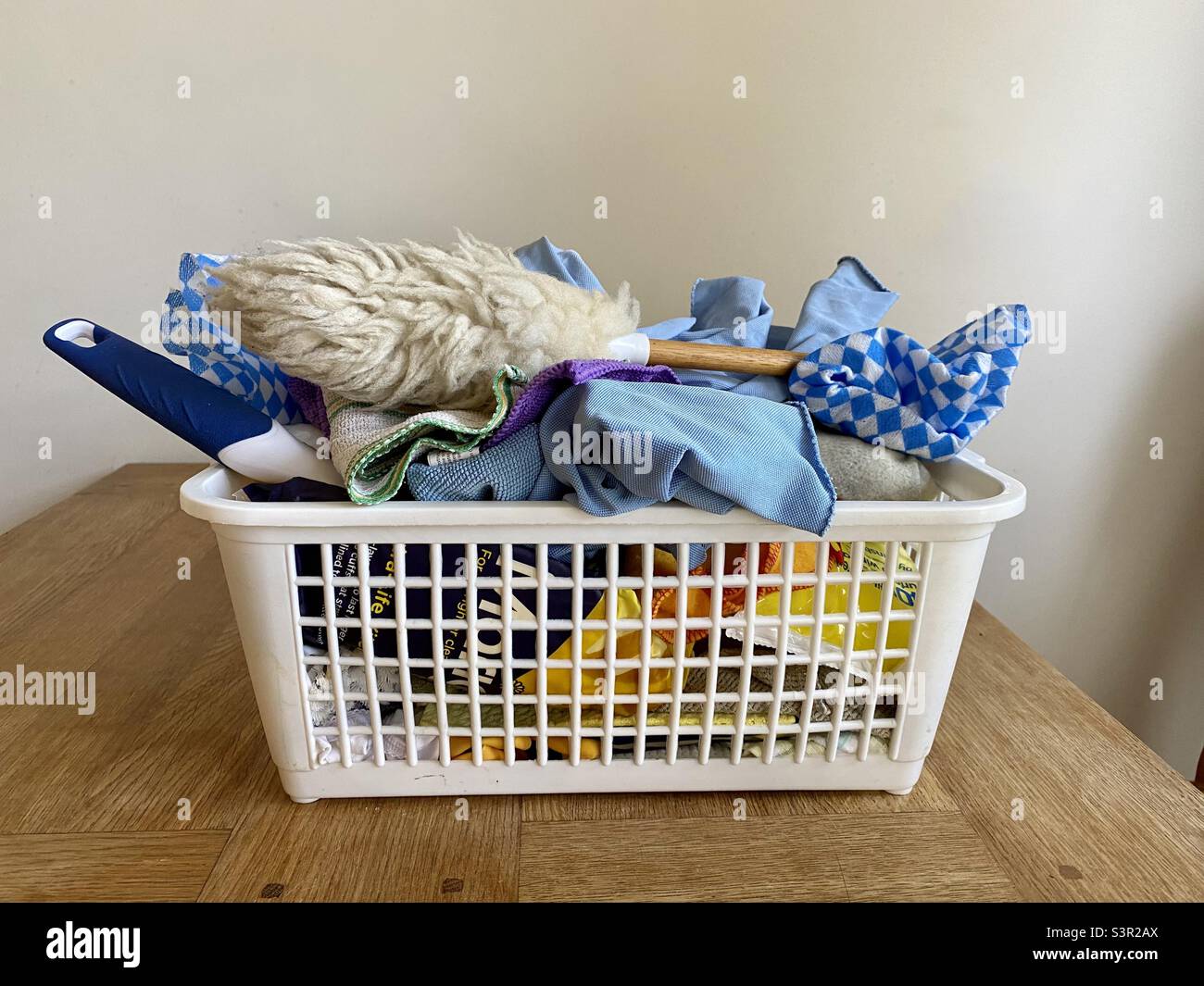 Basket of home cleaning equipment Stock Photo Alamy