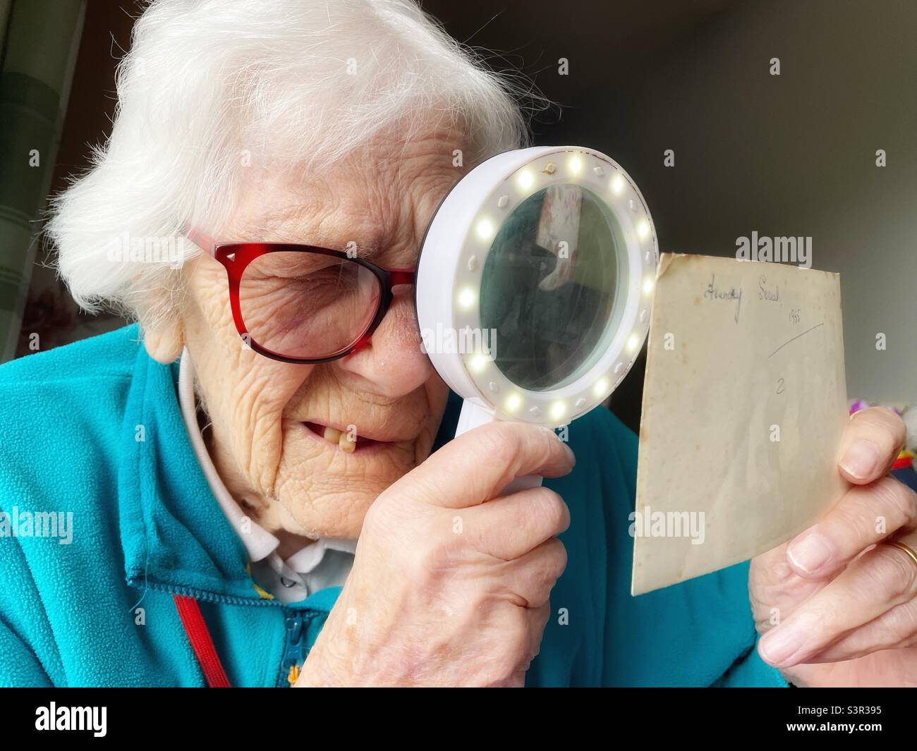 Woman suffering from age-related Macular Degeneration - Smartphone Captured Stock Image