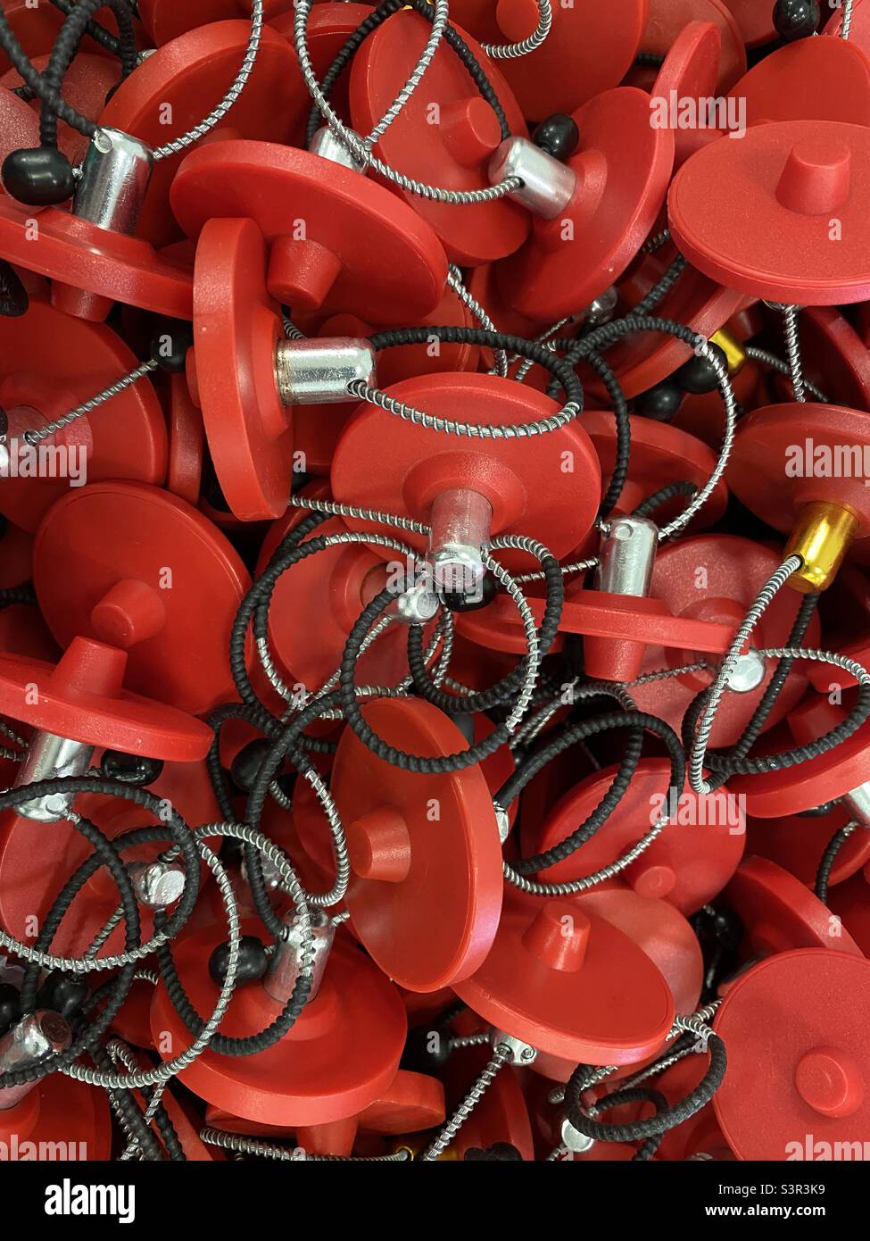 Antitheft security tags at a supermarket Stock Photo Alamy