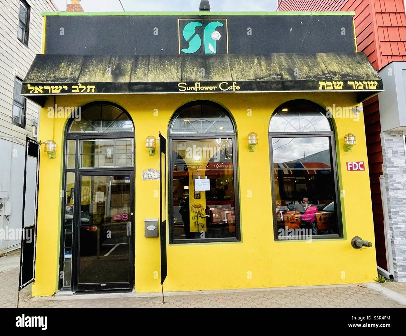 Bright yellow Sunflower Cafe in Lawrence, New York Stock Photo Alamy