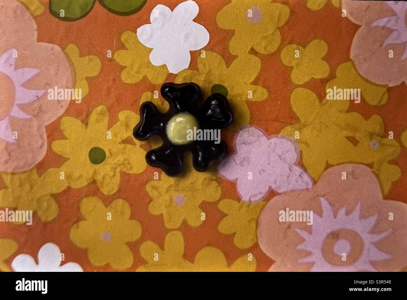 1960’s psychedelic vinyl in teenagers room with hippie flower - Smartphone Captured Stock Image