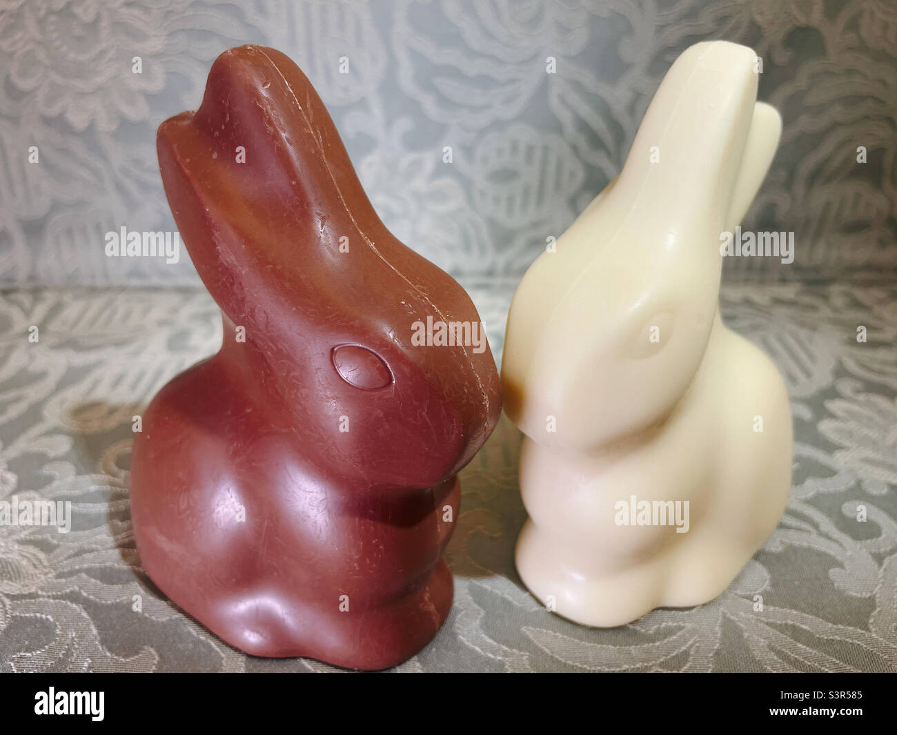 Still life of Black and white chocolate Easter bunny candies, 2022, USA - Smartphone Captured Stock Image