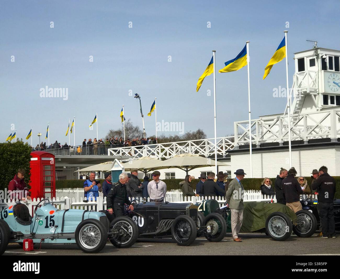 Frazier Nash vintage cars Assembly area at the Goodwood 79th Members’ Meeting with Ukrainian flags flying. - Smartphone Captured Stock Image