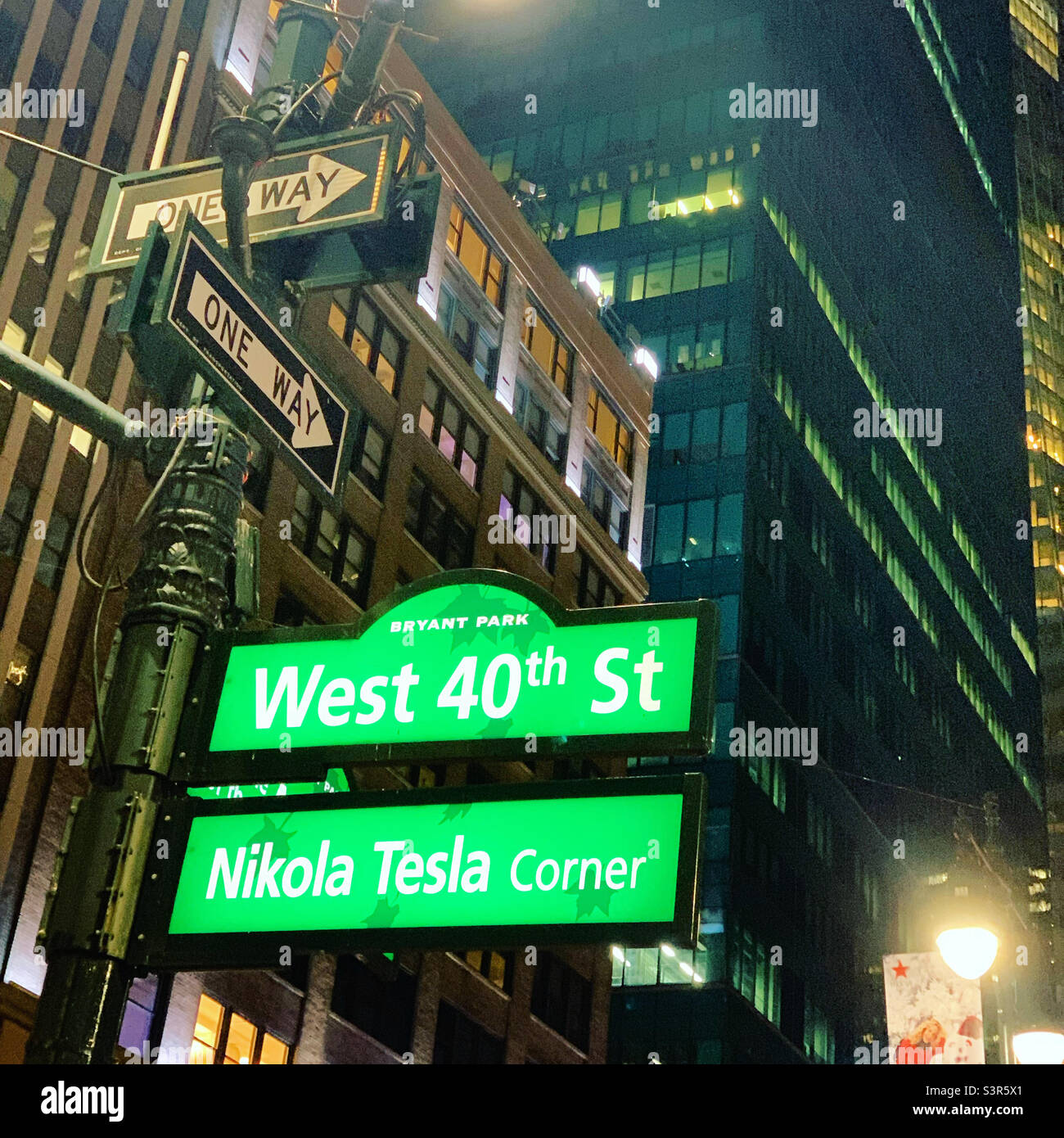 Street signs at night, Midtown Manhattan, New York, New York, United States - Smartphone Captured Stock Image