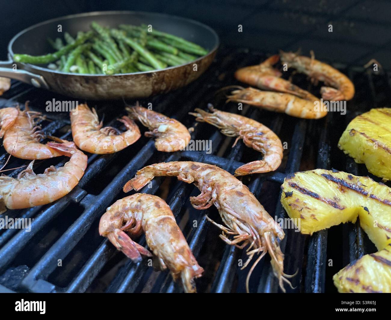 Grilled shrimp and pineapple dinner Stock Photo - Alamy
