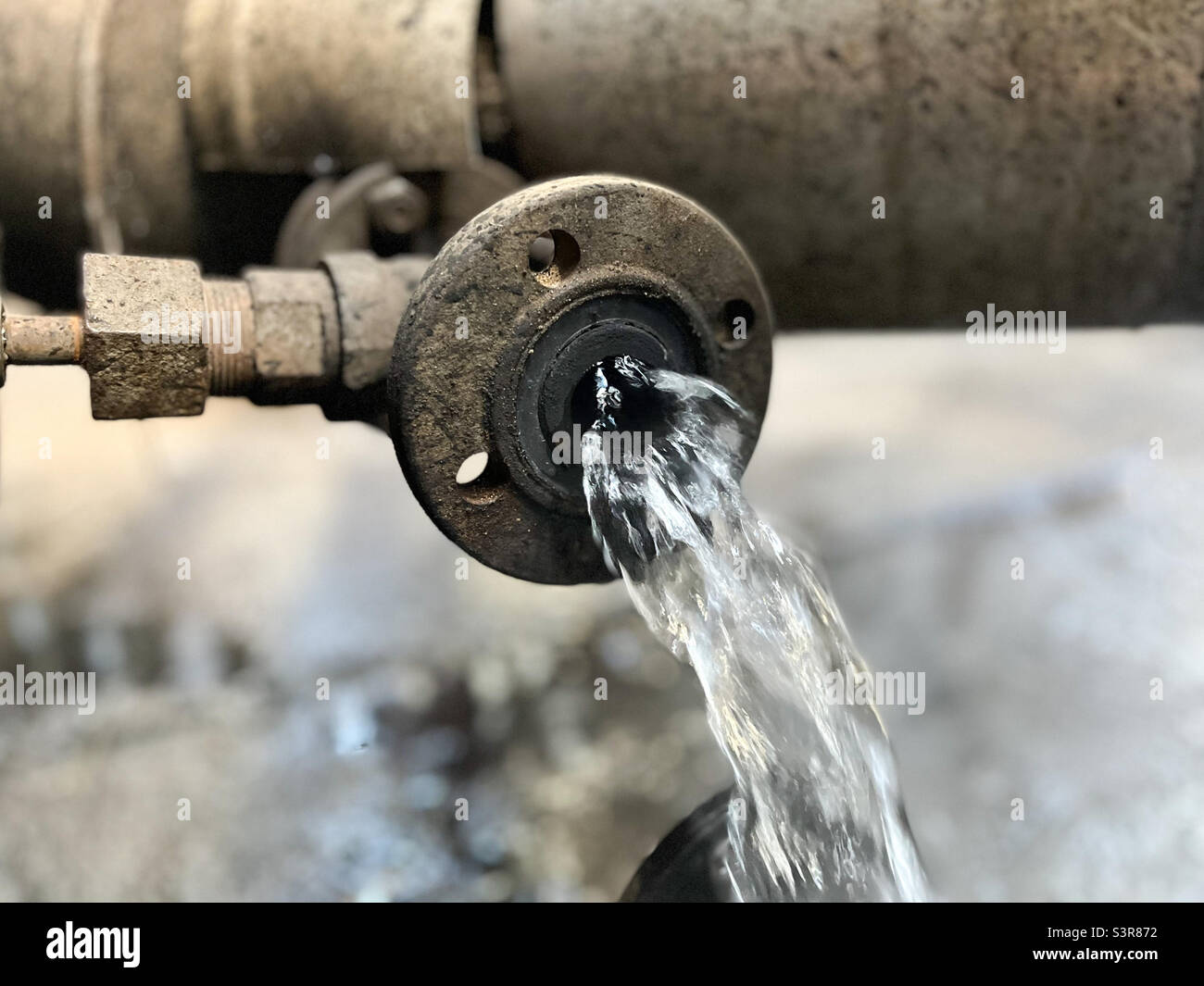 Drain valve for draining the liquid on the heat exchanger close-up - Smartphone Captured Stock Image
