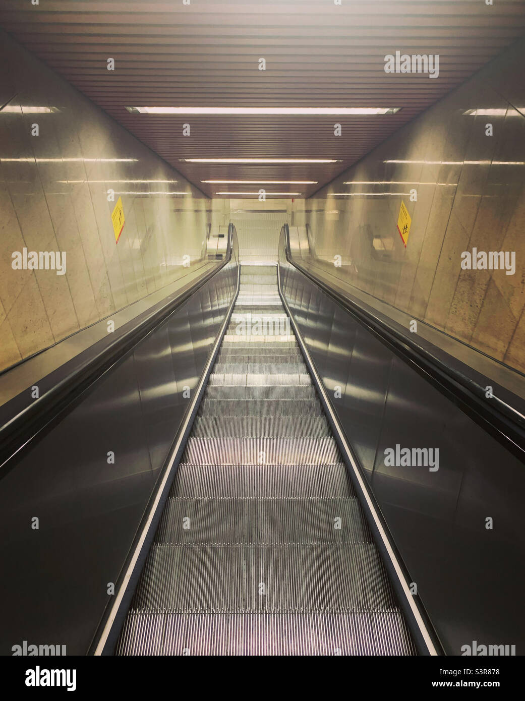 Escalator in Milan Duomo subway station. Italy. - Smartphone Captured Stock Image