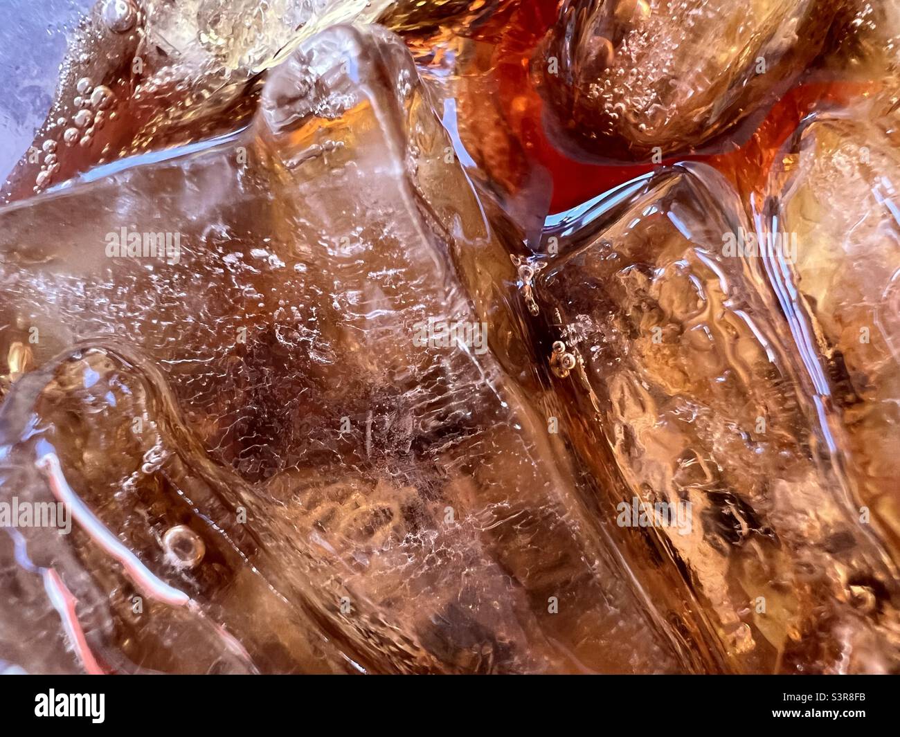 Zoomed in soda with ice Stock Photo
