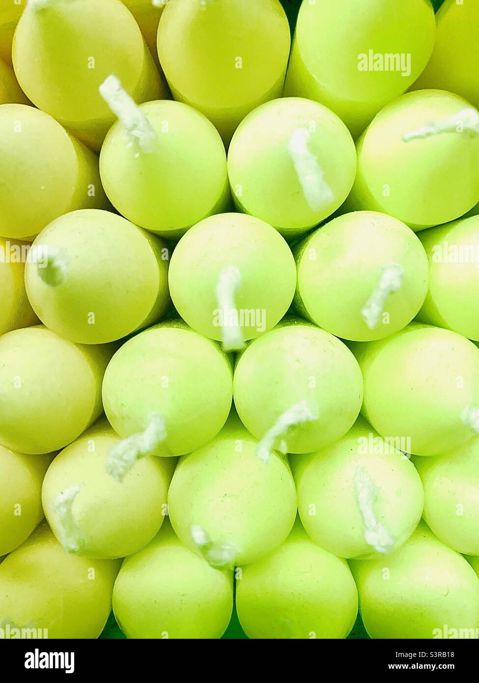 Closeup of Pastel Green Handmade Candle Selection - Smartphone Captured Stock Image