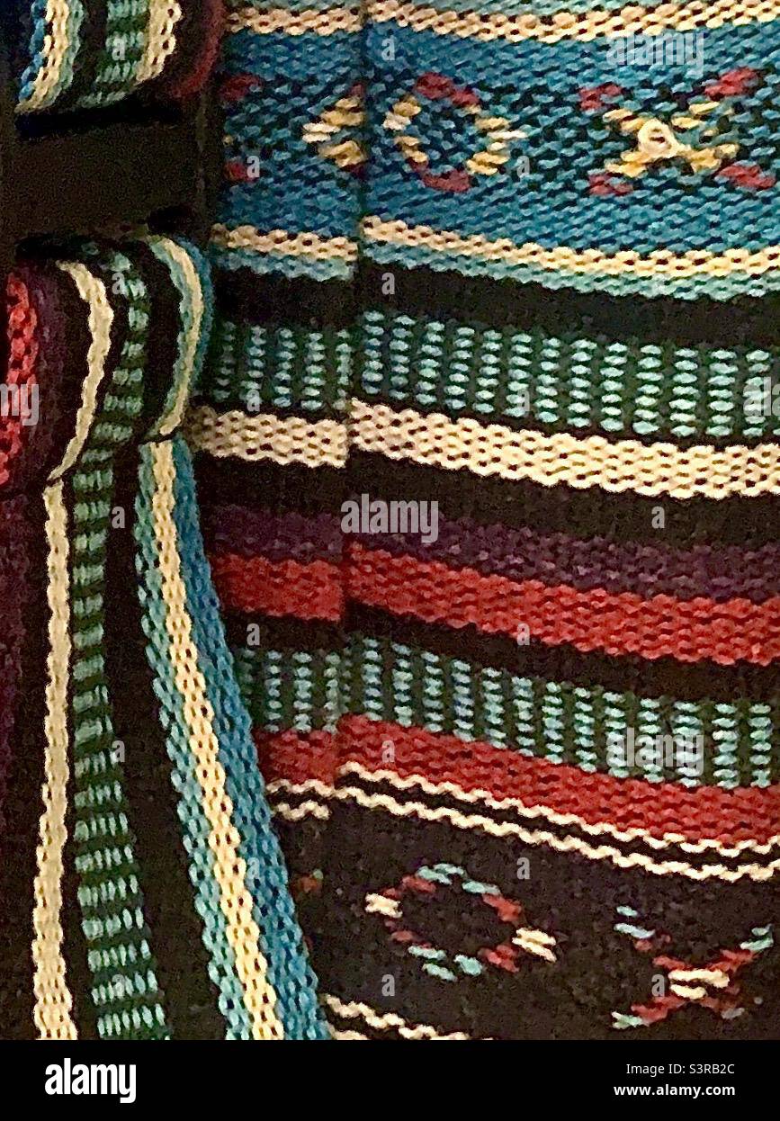 Closeup Burgundy Blue and Natural Colors Boho Fabric Backpack - Smartphone Captured Stock Image