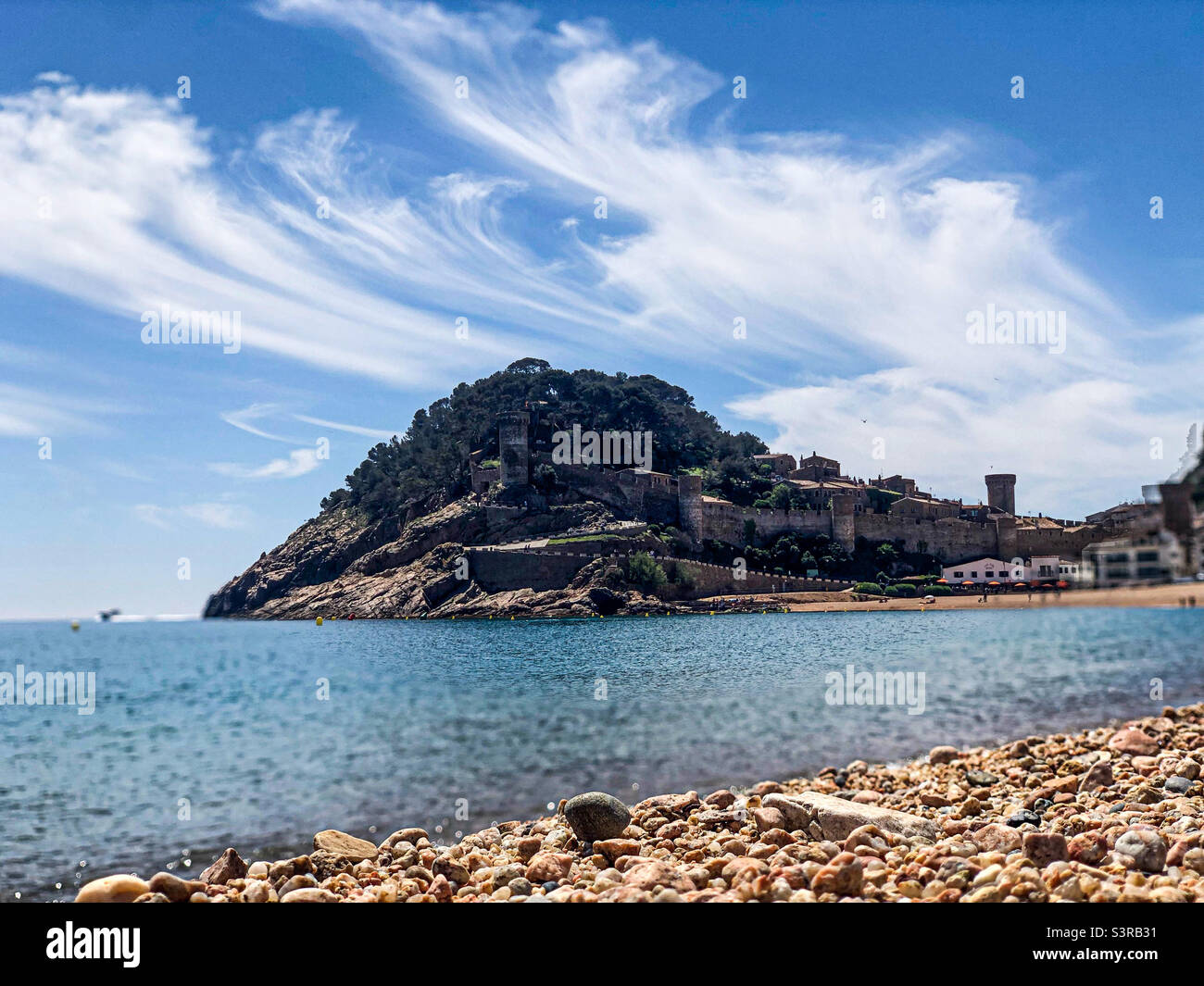 Wall of on the beach Platja Gran at Tossa de Mar in the province of Girona Stock Photo